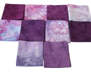 Hand dyed quilting cotton in shades of purple and pink